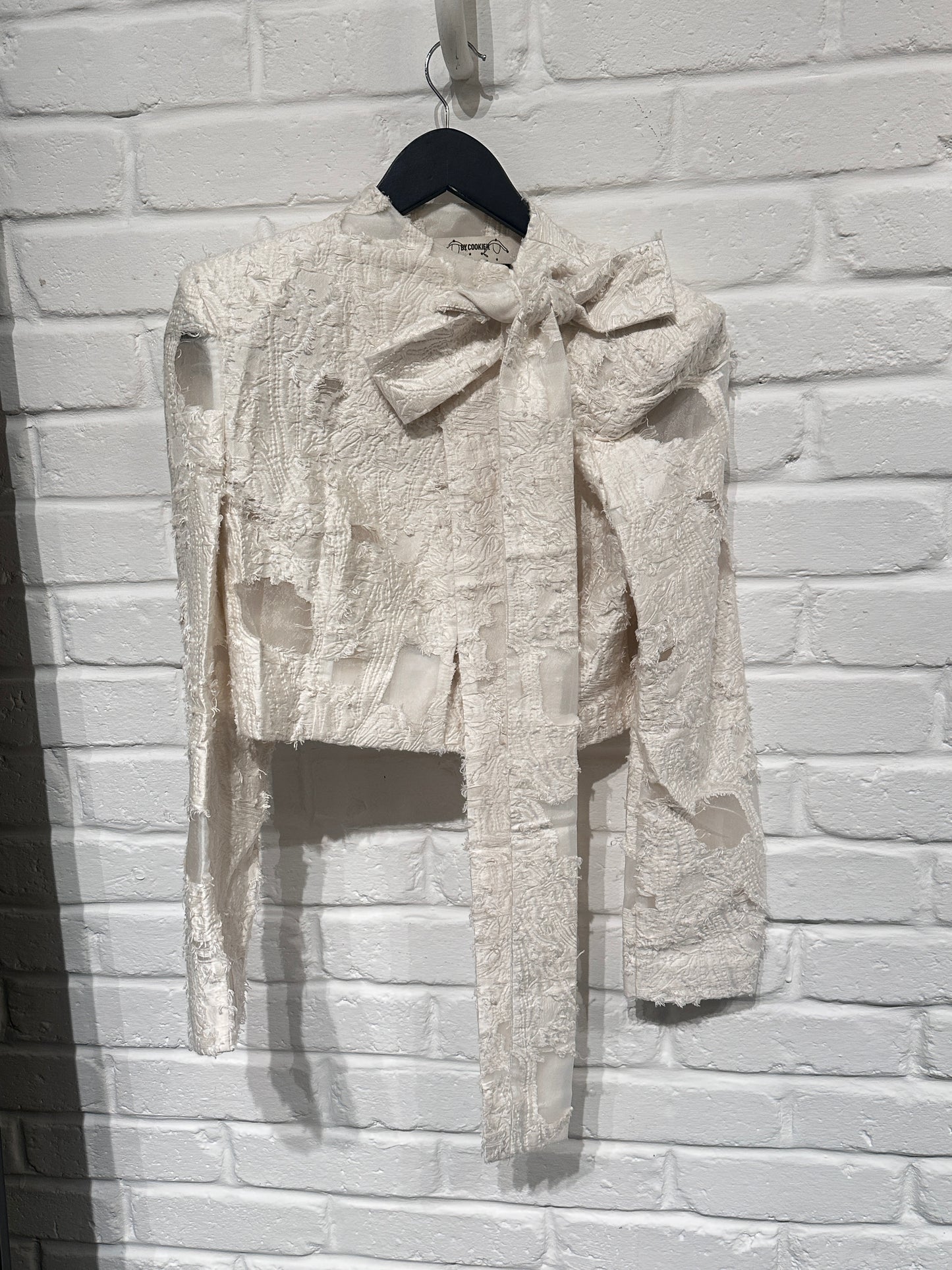 By Cookie H. Cropped Suit the Bow
